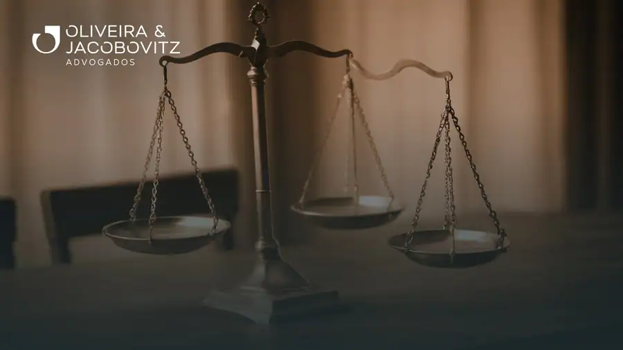 Lawyer reviewing court case documents alongside a client in an office